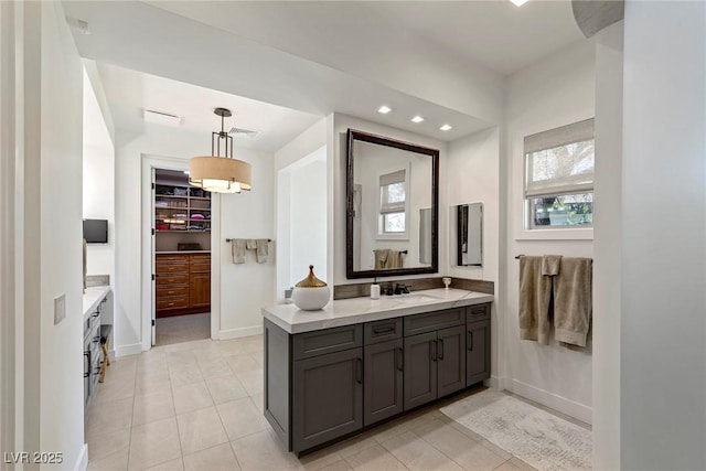 bathroom featuring tile patterned floors and vanity