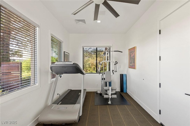 workout area featuring ceiling fan