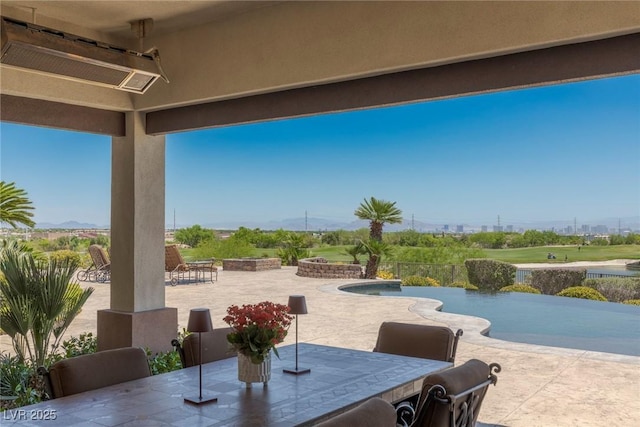 view of patio with a bar