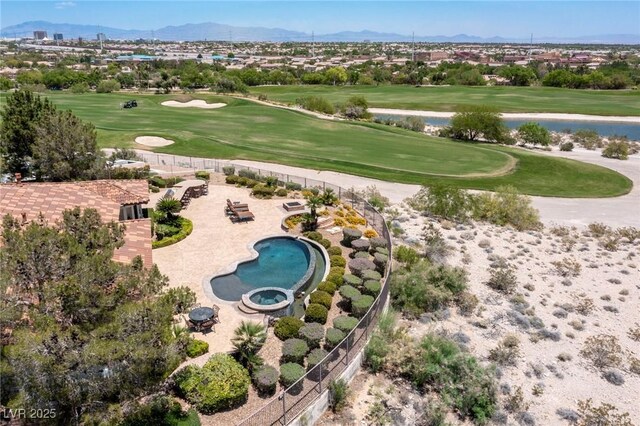 birds eye view of property with a mountain view