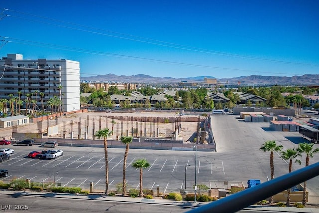 birds eye view of property with a mountain view