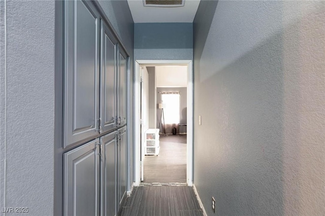 hall featuring dark hardwood / wood-style flooring