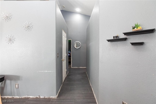 corridor with dark tile patterned floors