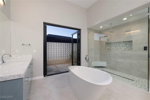 bathroom with vanity and plus walk in shower