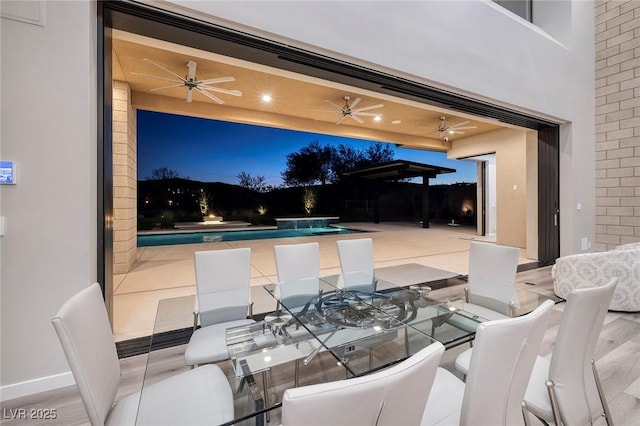 view of patio / terrace featuring ceiling fan