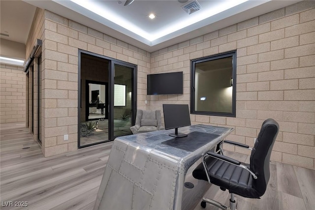 home office featuring light hardwood / wood-style flooring