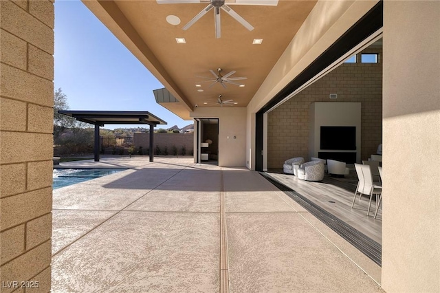 view of patio / terrace with ceiling fan