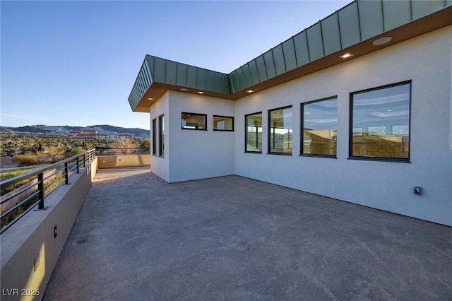 view of side of property featuring a mountain view