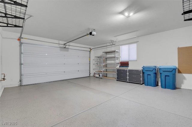 garage featuring a garage door opener