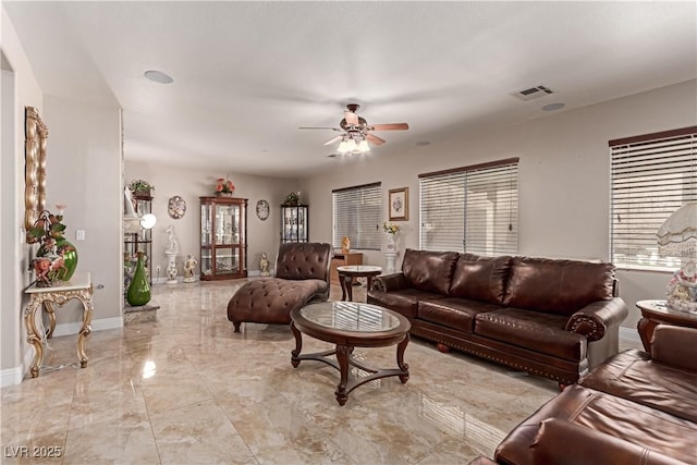 living room with ceiling fan