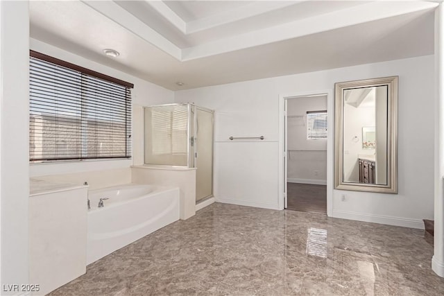 bathroom with separate shower and tub