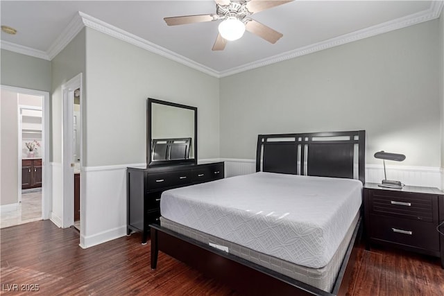 bedroom with ceiling fan, crown molding, and dark hardwood / wood-style floors