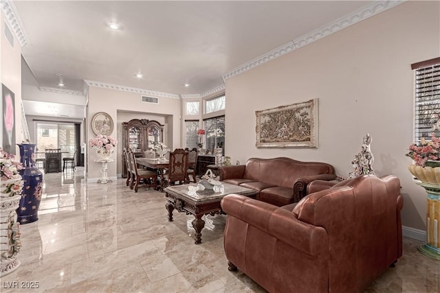 living room with ornamental molding