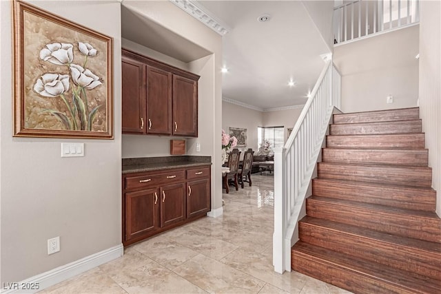 staircase with crown molding