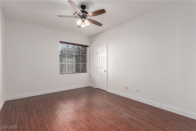 unfurnished room featuring ceiling fan and dark wood-type flooring