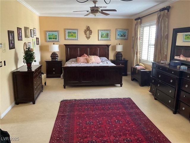 carpeted bedroom featuring ceiling fan and ornamental molding