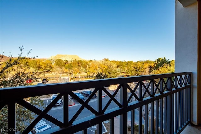 balcony featuring a mountain view