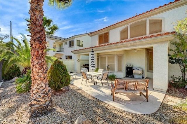 back of house with a patio area