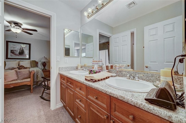 bathroom with vanity and ceiling fan