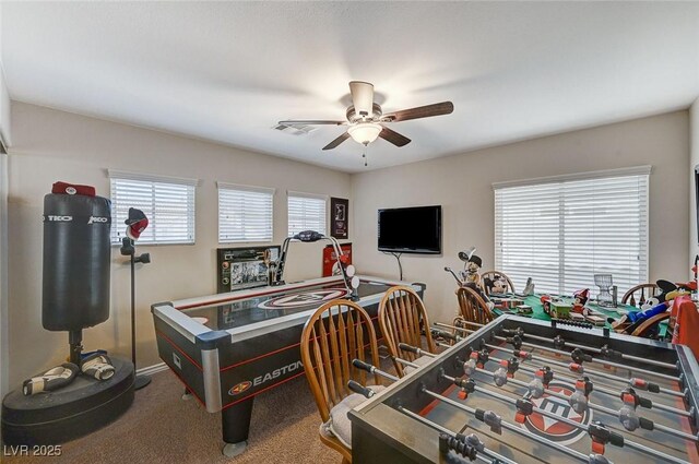 game room featuring carpet floors and ceiling fan