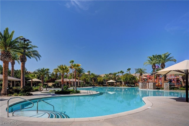 view of pool featuring a patio area