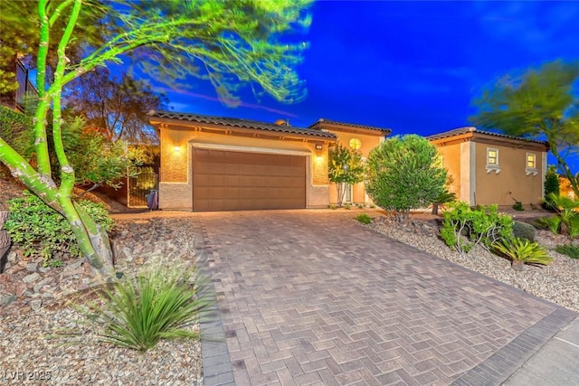 view of front of home featuring a garage