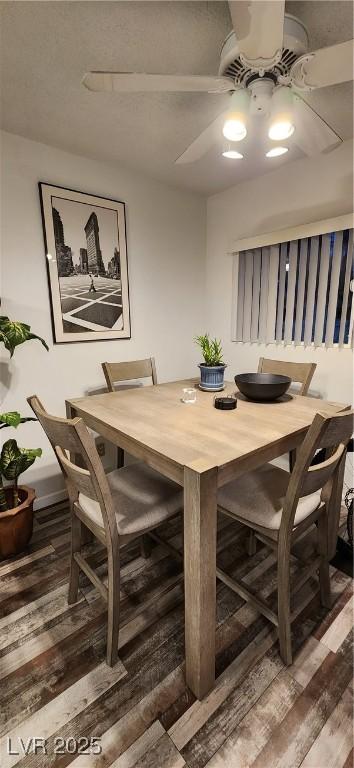 dining room with hardwood / wood-style flooring