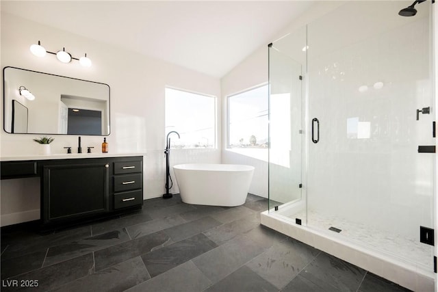 bathroom with vanity, plus walk in shower, and vaulted ceiling