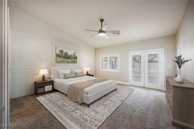 carpeted bedroom featuring lofted ceiling, access to outside, french doors, and ceiling fan