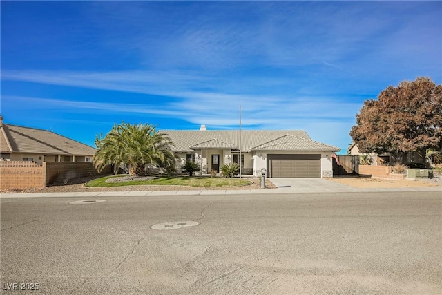 single story home with a garage