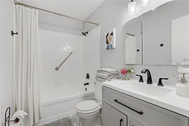 bathroom with toilet, shower / bath combo, and vanity