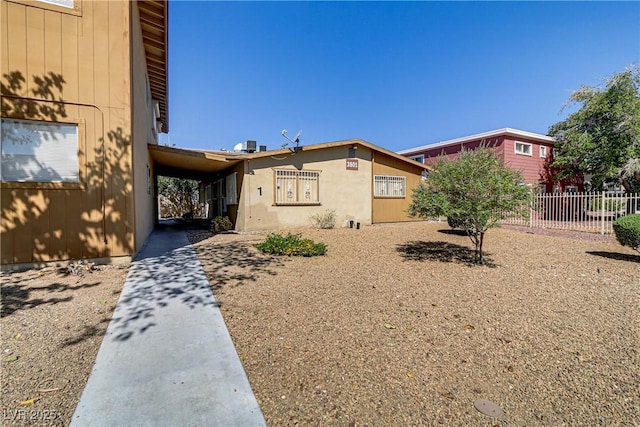 exterior space featuring fence