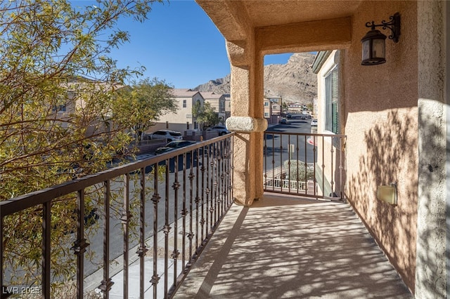 balcony featuring a mountain view