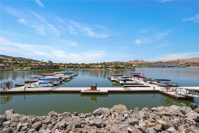 dock area with a water and mountain view