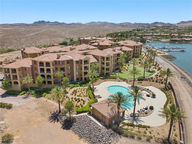 bird's eye view featuring a water and mountain view