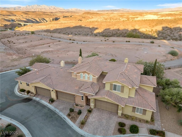 bird's eye view with a mountain view