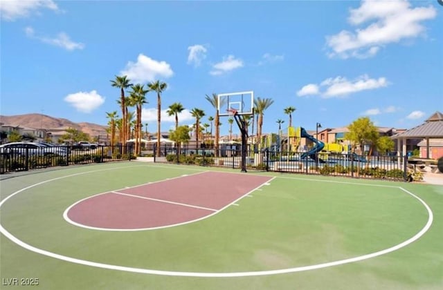 view of basketball court with a mountain view