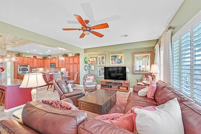 living room with ceiling fan