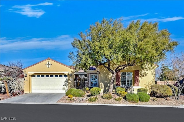 ranch-style house featuring a garage