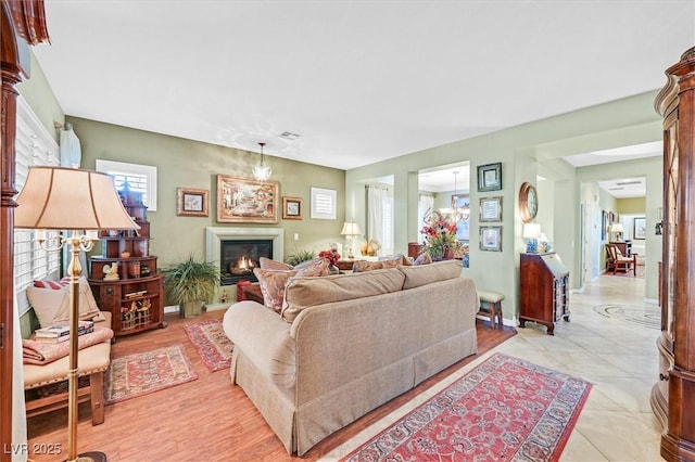 living room with light tile patterned flooring