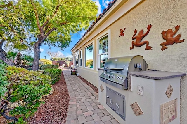 view of patio / terrace featuring a grill