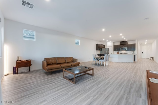 living room featuring light hardwood / wood-style flooring