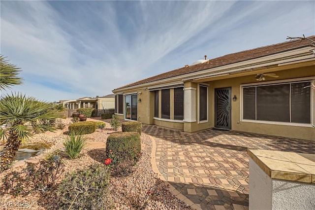 back of house featuring a patio