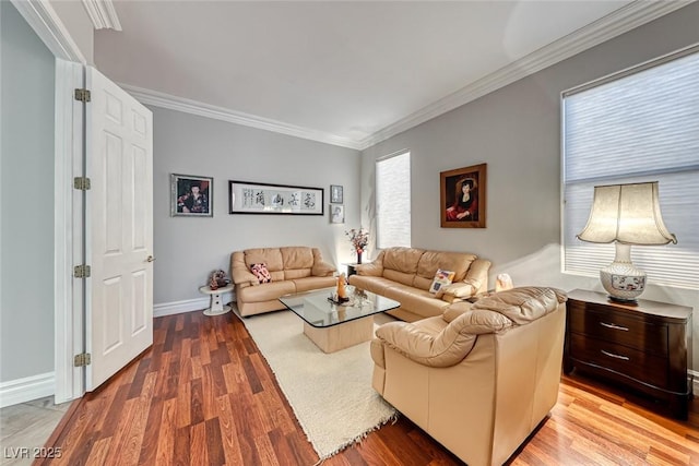 living room featuring hardwood / wood-style flooring and ornamental molding