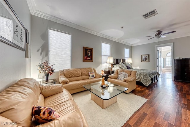 living room featuring ornamental molding, dark hardwood / wood-style floors, and ceiling fan