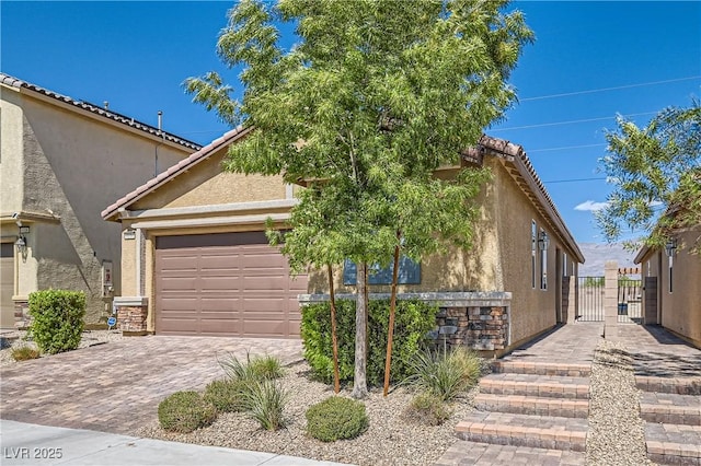 view of front of home with a garage