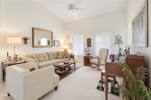 living room with light carpet, ceiling fan, and lofted ceiling