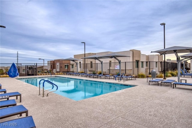 view of pool featuring a patio area