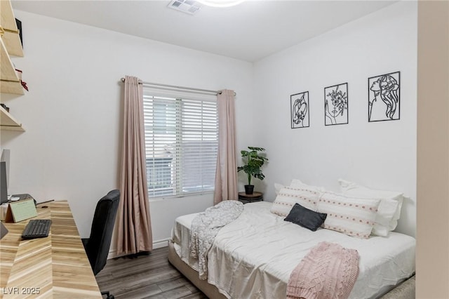 bedroom featuring hardwood / wood-style flooring