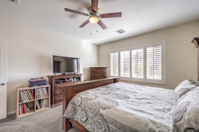 bedroom with light colored carpet and ceiling fan